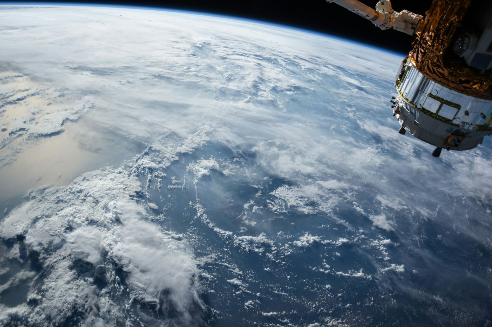 Earthrise over the lunar horizon